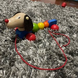 Multi colored wiener dog pully toy